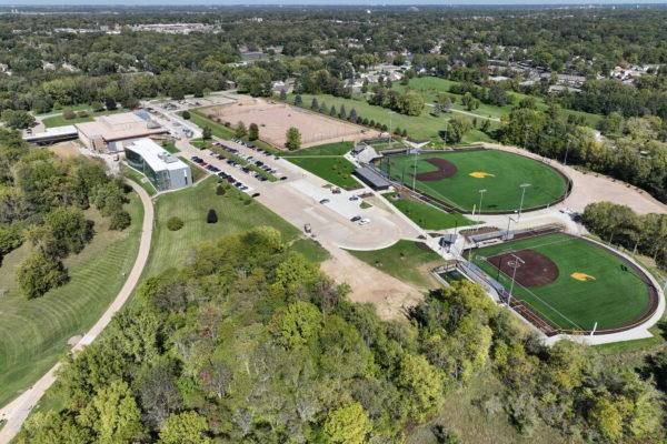 An aerial view of a green field